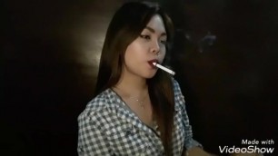 Beautiful Asian Girl Smoking