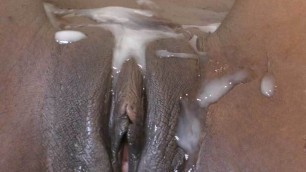 Chocolate pussy covered with thick cum