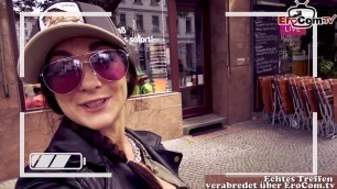 german instagram girl pick up a Fan on Street in supermarket
